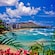 Waikiki Beach overlooking clear water with the volcanic cone, Diamond Head